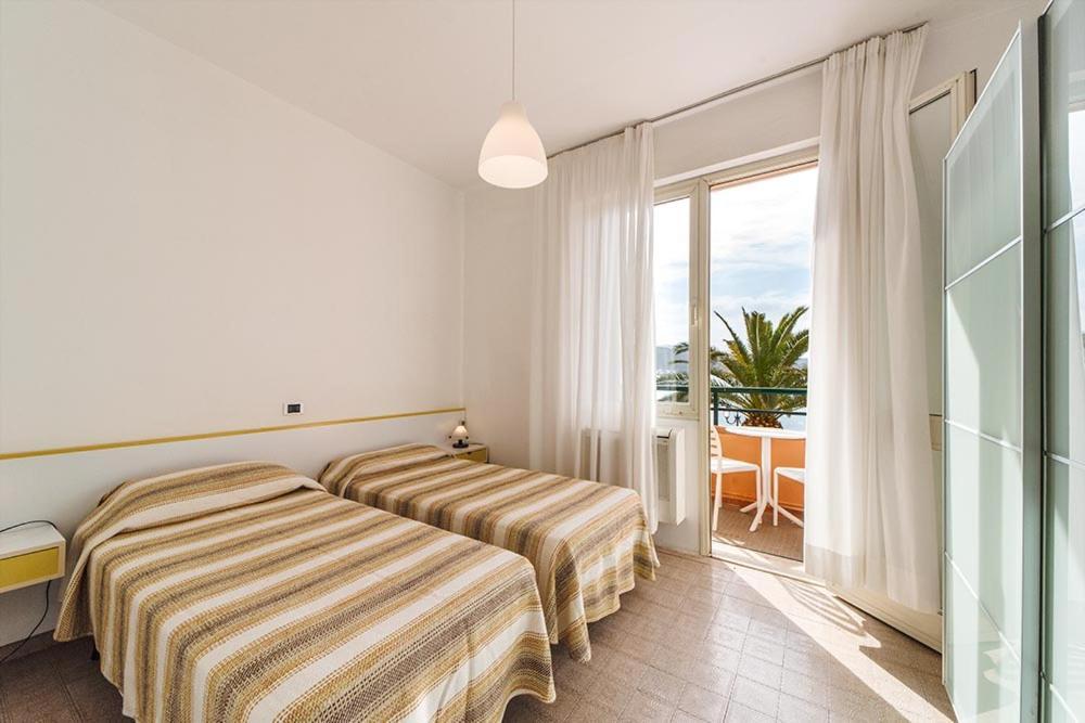 Hotel Belmare Porto Azzurro Bagian luar foto