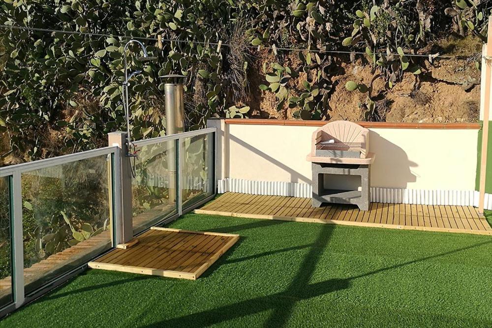 Hotel Belmare Porto Azzurro Bagian luar foto