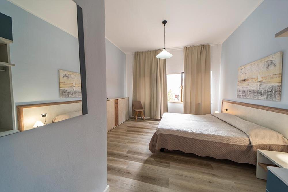 Hotel Belmare Porto Azzurro Bagian luar foto